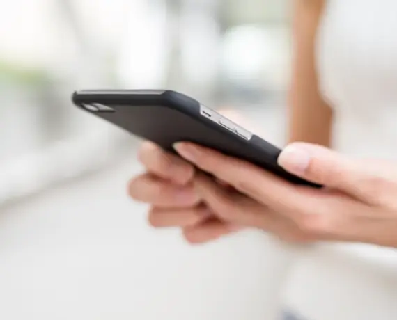 Image of a woman engaged with her phone