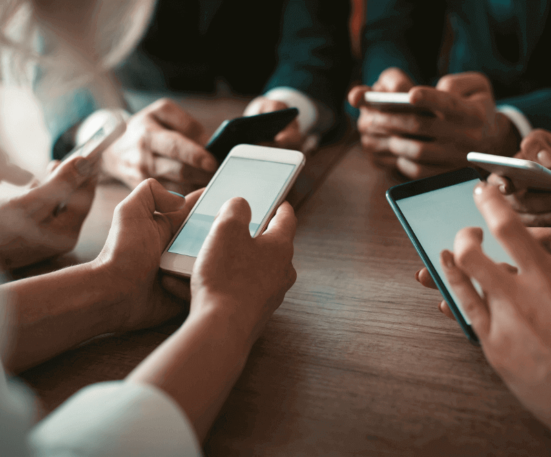 Image of people holding real devices