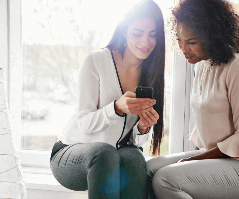 Image of woman using IOS device coverage